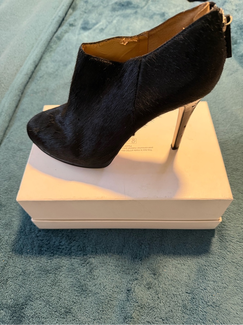 Nine West Black Faux-Fur Ankle Bootie with Metallic Heel